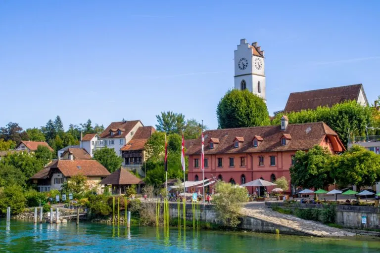 A Swiss town on the river in summer light